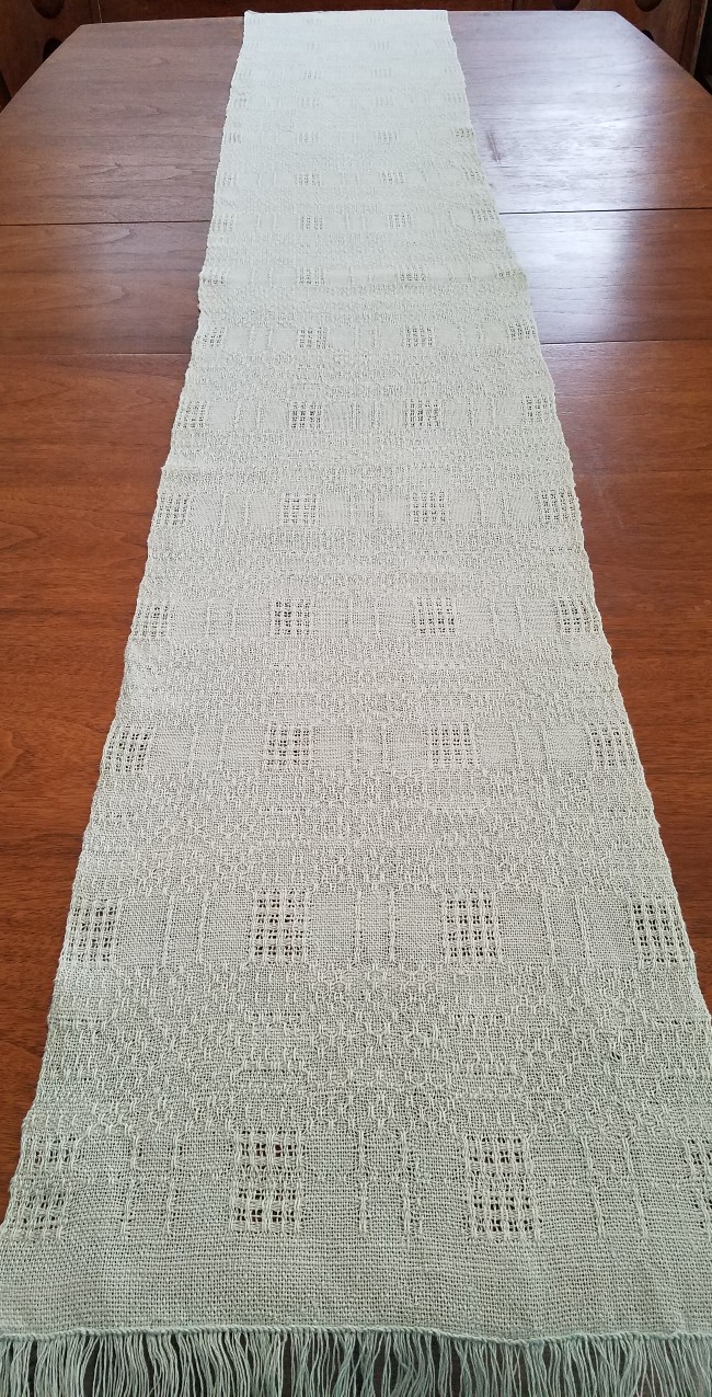 A 72 in. dining table runner.